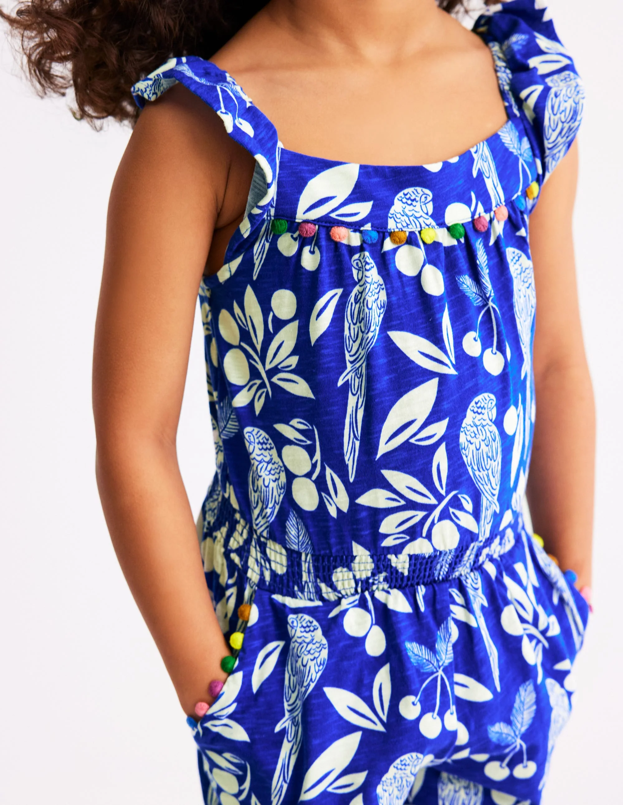 Ciara Pom Trim Jersey Romper-Bright Blue Parrot Palm